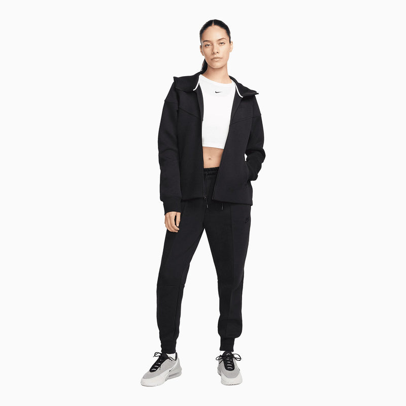 Women's Sportswear Tech Fleece Windrunner Tracksuit (Black) featuring zippered pockets, ribbed ankle cuffs, and a lightweight paneled hood