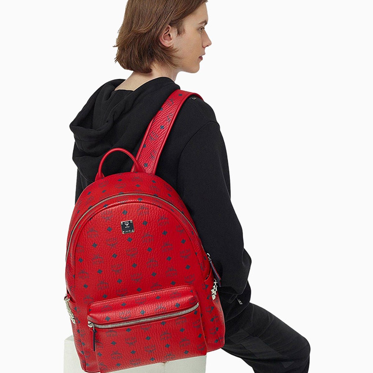 Red mcm backpack with studs sale