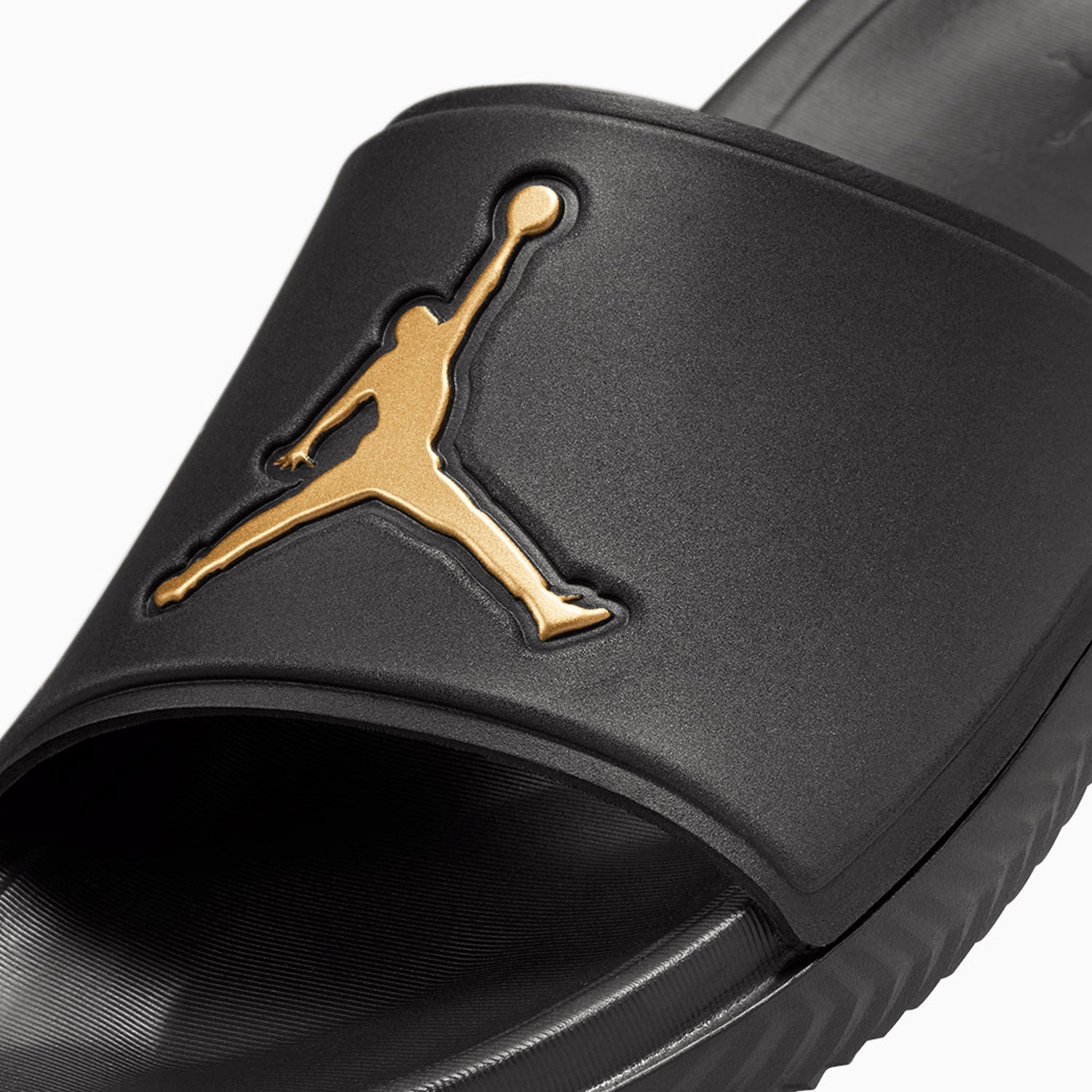 Jordan slides black and gold best sale